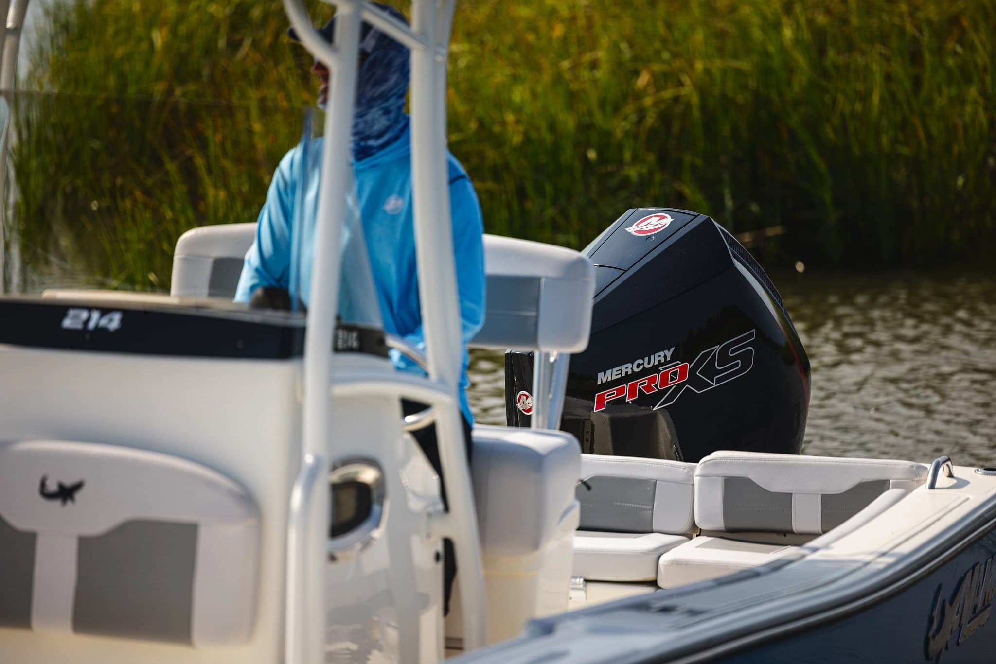 A Mercury Pro XS outboard on the transom of a center console boat